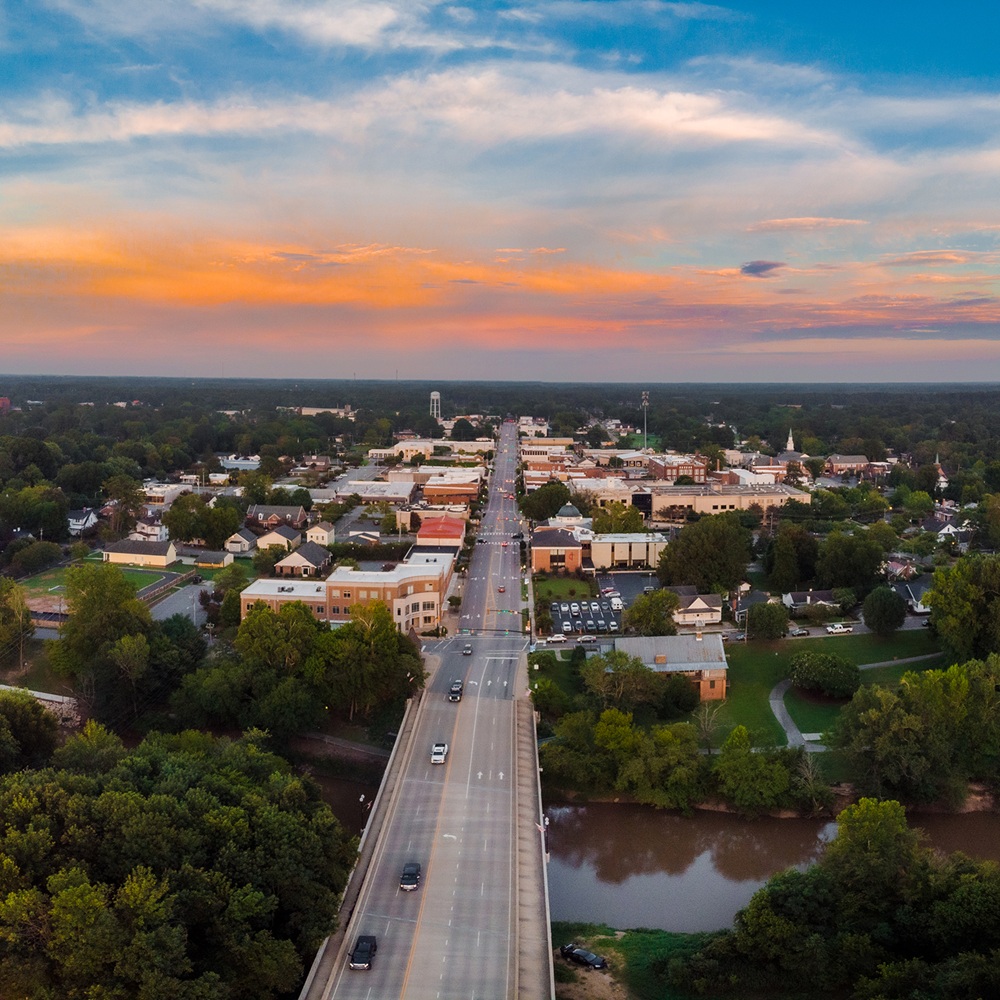 Expert Septic Innovations technician performing maintenance on a septic system in Johnston County