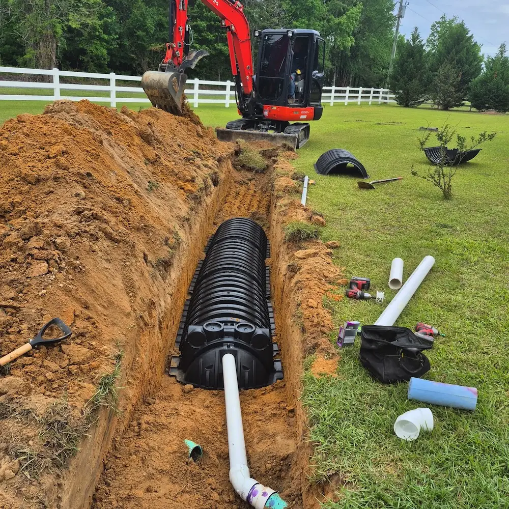 Skilled technicians from Septic Innovations performing septic installation at a North Carolina residence