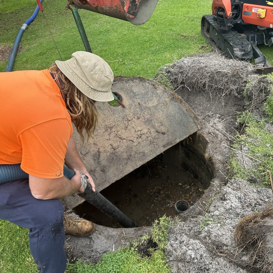 Septic Innovations technician conducting reliable septic preventative maintenance in a North Carolina residence